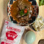 Delicious beef soup with fresh chili and herbs in Jakarta. Vibrant and flavorful dish showcasing Indonesian culinary traditions.