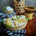 Delicious traditional Indonesian cassava snack topped with grated coconut, served in Bandung, West Java.