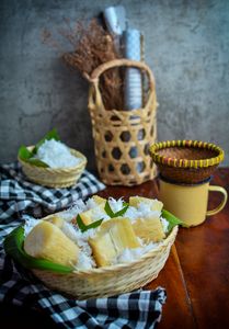 Delicious traditional Indonesian cassava snack topped with grated coconut, served in Bandung, West Java.