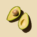 Imgi 117 fresh ripe green avocado fruit halves on beige background healthy food diet and detox concept flat lay top view copy space stockpack gettyimages