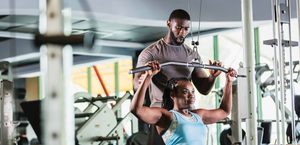 Imgi 158 personal trainer and client at gym