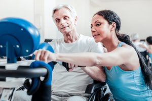 Imgi 186 Female Trainer and older male client e1596580260192