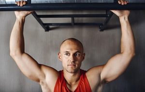 Imgi 207 thinking pull up man focus fitness power performance arm strength growth muscle building development idea mindset strong male athlete contemplat