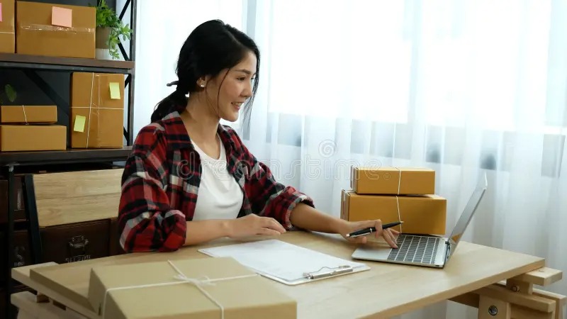 Imgi 396 online seller close up hands young asian woman typing laptop keyboard checking online order check goods stock delivery package