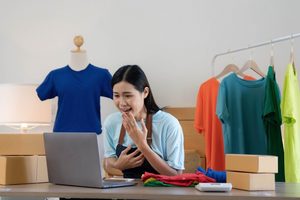 Imgi 429 young asian women happy after new order from customer surprise shock face asian woman success making big sale his online store online
