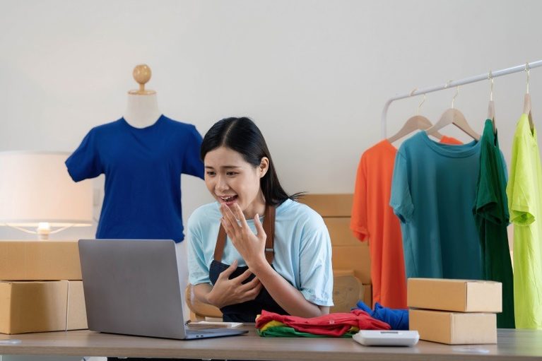 Imgi 429 young asian women happy after new order from customer surprise shock face asian woman success making big sale his online store online