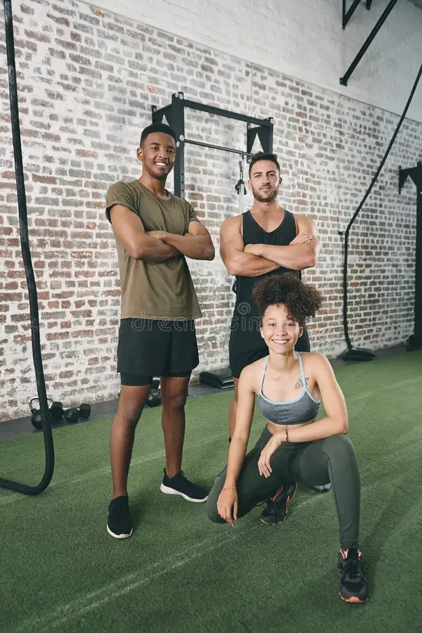 Imgi 530 smile portrait training people gym fitness partner health diversity us workout team exercise target group